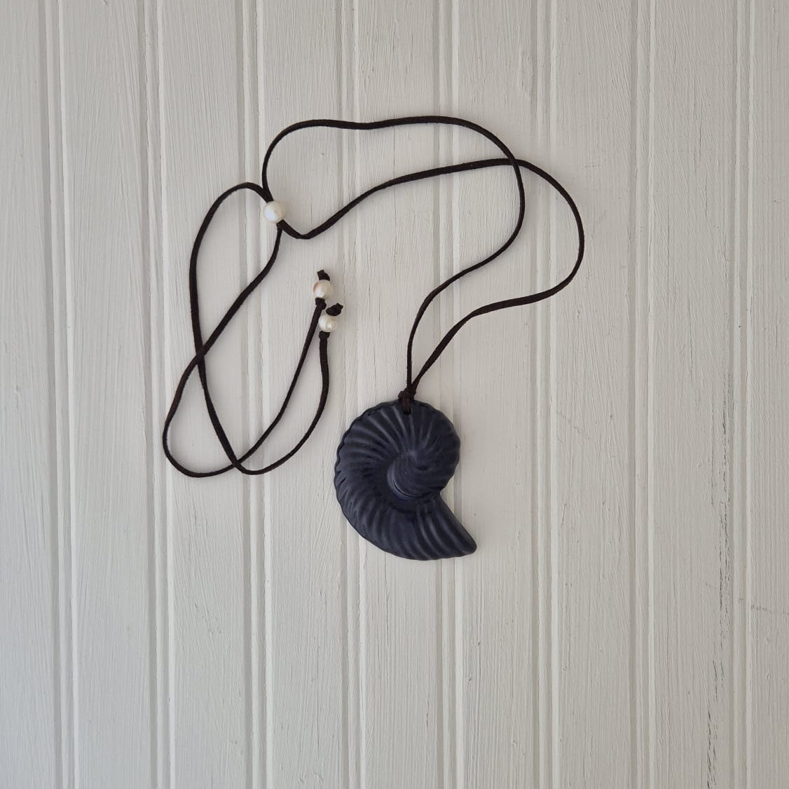 Navy Shell on Leather Cord with Pearl Ends
