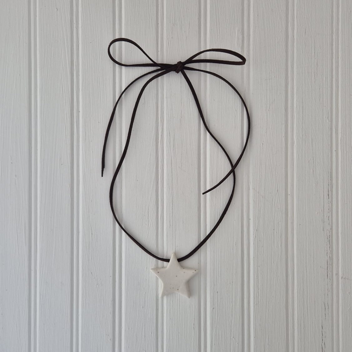 Speckled Star on Leather Cord