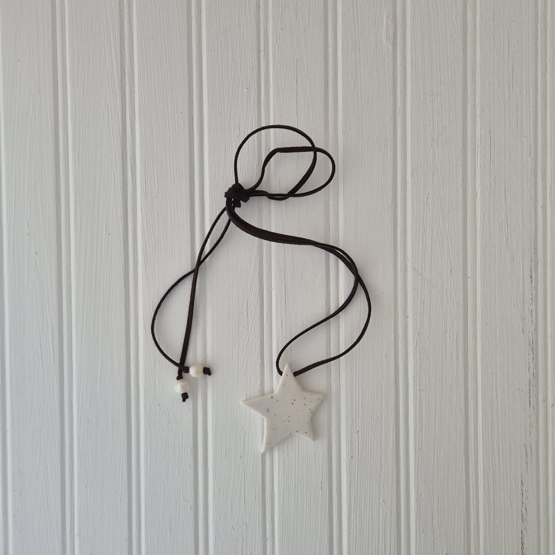 Speckled Diagonal Star on Leather Cord