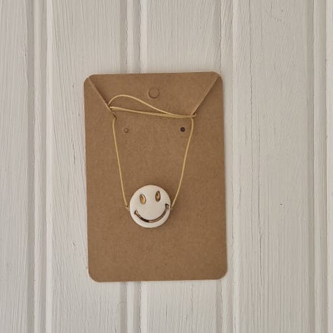 White and Gold Smiley String Necklace