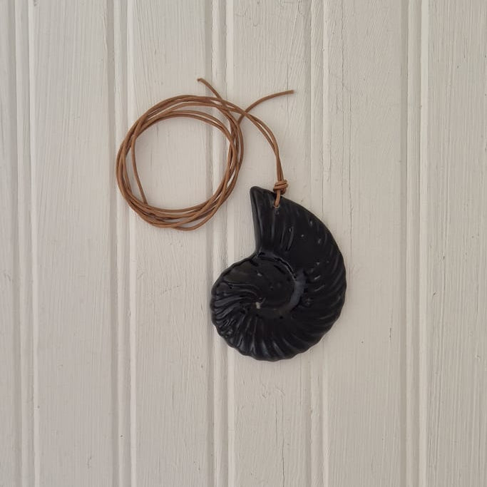 Black Shell On Leather